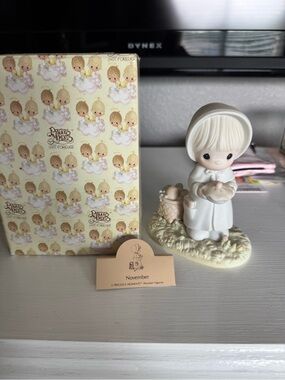 Enesco Precious Moments Porcelain Figurine in Cream and White